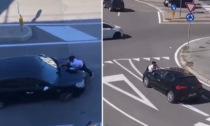 Padova, il video virale della donna aggrappata al cofano della Giulietta dopo la lite in strada